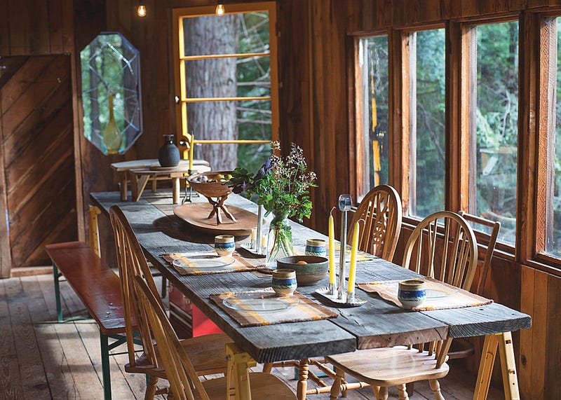 Nightly group dinners are a key part of the experience (📷 Andres Gonzalez for the [New York Times](https://www.nytimes.com/2016/03/20/t-magazine/design/fritz-haeg-salmon-creek-farm-commune.html))